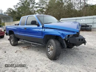 1999 Dodge Ram 2500 with VIN 1B7KF2363XJ504002, listed as a Copart auction lot 73557954 with 297,618 mi miles and Salvage Title. Bid and sale history available at carsss.com. Image 4.