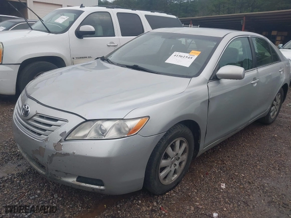 2007 Toyota Camry CE with VIN 4T1BE46K77U513111, listed as a IAAI auction lot 41561545 with 310,776 mi miles. Bid and sale history available at carsss.com. Image 2.
