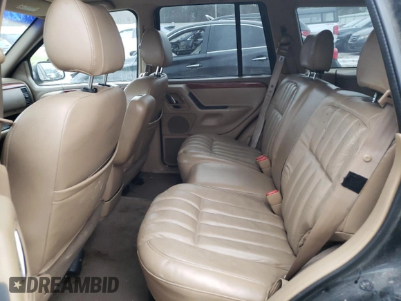 1999 Jeep Grand Cherokee Limited with VIN 1J4GW68SXXC713416, listed as a Copart auction lot 88296395 with 0 mi miles and Non Repairable. Bid and sale history available at carsss.com. Image 10.
