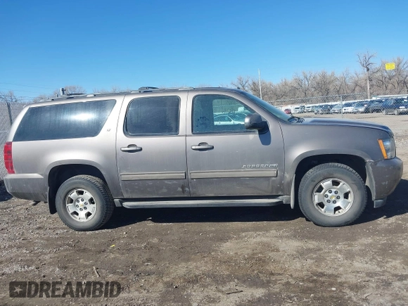 2011 Chevrolet Suburban LT with VIN 1GNSKJE34BR335361, listed as a IAAI auction lot 41736341 with 170,422 mi miles. Bid and sale history available at carsss.com. Image 14.