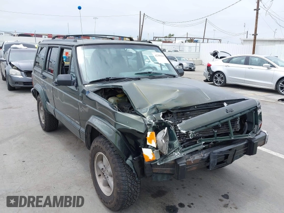 1996 Jeep Cherokee Sport z VIN 1J4FT68S6TL267408, wystawiony jako IAAI lot #42385629 z przebiegiem 268 753 mil mil oraz . Historia ofert i sprzedaży dostępna na DreamBid. Obrazek 6.