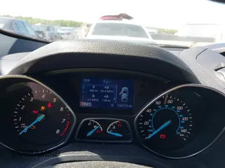 2014 Ford Escape SE with VIN 1FMCU0GX2EUB40356, listed as a IAAI auction lot 42142617 with 156,703 mi miles. Bid and sale history available at carsss.com. Image 7.