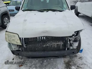2007 Mercury Mariner Convenience z VIN 4M2YU80Z17KJ17566, wystawiony jako Copart lot #86136014 z przebiegiem 134 328 mil mil oraz Szkody całkowita. Historia ofert i sprzedaży dostępna na DreamBid. Obrazek 12.