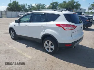 2013 Ford Escape SE with VIN 1FMCU0GX5DUA85464, listed as a IAAI auction lot 42701315 with 158,093 mi miles and . Bid and sale history available at DreamBid. Image 3.