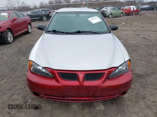 2003 Pontiac Grand Am SE with VIN 1G2NE52F03C323218, listed as a IAAI auction lot 41899309 with 90,195 mi miles. Bid and sale history available at carsss.com. Image 12.