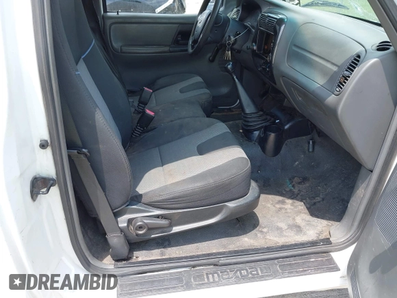 2007 Mazda B-Series Truck with VIN 4F4YR12D37PM03431, listed as a IAAI auction lot 42133980 with 330,728 mi miles and . Bid and sale history available at DreamBid. Image 8.