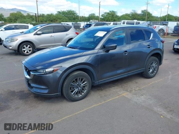 2021 Mazda CX-5 Touring with VIN JM3KFACM2M1348305, listed as a IAAI auction lot 41627199 with 30,044 mi miles. Bid and sale history available at carsss.com. Image 18.