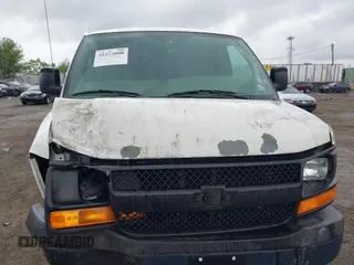 2012 Chevrolet Express Cargo with VIN 1GCWGFFA8C1108597, listed as a IAAI auction lot 42323808 with 200,965 mi miles and . Bid and sale history available at DreamBid. Image 6.