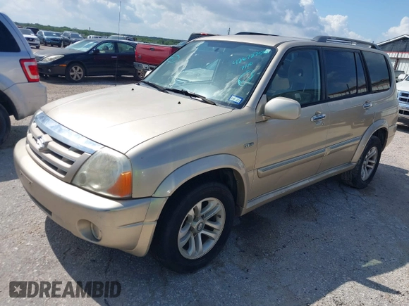 2006 Suzuki XL7 with VIN JS3TX92V064101841, listed as a IAAI auction lot 42672750 with 203,052 mi miles and . Bid and sale history available at DreamBid. Image 2.
