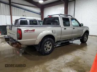 2004 Nissan Frontier XE z VIN 1N6ED29Y64C419454, wystawiony jako Copart lot #56629355 z przebiegiem 214 296 mil mil oraz Szkoda całkowita • Salvage title. Historia ofert i sprzedaży dostępna na DreamBid. Obrazek 3.