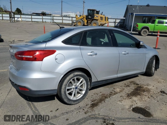 2015 Ford Focus SE with VIN 1FADP3F28FL241020, listed as a Copart auction lot 54559135 with 123,008 mi miles and Salvage title. Bid and sale history available at DreamBid. Image 3.