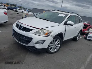 2012 Mazda CX-9 Grand Touring with VIN JM3TB2DV1C0365341, listed as a IAAI auction lot 42034276 with 141,725 mi miles and . Bid and sale history available at DreamBid. Image 2.