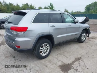 2018 Jeep Grand Cherokee Laredo z VIN 1C4RJFAG0JC129021, wystawiony jako IAAI lot #42413165 z przebiegiem 103 743 mil mil oraz . Historia ofert i sprzedaży dostępna na DreamBid. Obrazek 4.