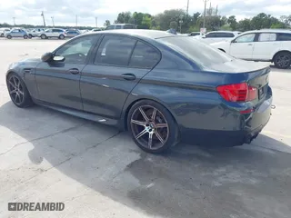 2013 BMW M5 with VIN WBSFV9C59DD096774, listed as a IAAI auction lot 41608286 with 82,601 mi miles. Bid and sale history available at carsss.com. Image 3.