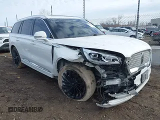 2021 Lincoln Aviator Reserve z VIN 5LM5J7XC5MGL18763, wystawiony jako IAAI lot #41674701 z przebiegiem 92 284 mil mil oraz . Historia ofert i sprzedaży dostępna na DreamBid. Obrazek 1.