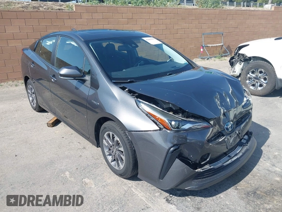 2021 Toyota Prius L Eco with VIN JTDKAMFU4M3144985, listed as a IAAI auction lot 42443957 with 20,816 mi miles and . Bid and sale history available at DreamBid. Image 1.