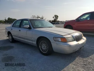 2000 Mercury Grand Marquis GS z VIN 2MEFM74W0YX715104, wystawiony jako Copart lot #54357855 z przebiegiem 111 231 mil mil oraz Szkoda całkowita • Salvage title. Historia ofert i sprzedaży dostępna na DreamBid. Obrazek 4.