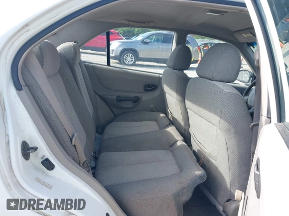 2002 Hyundai Accent GL with VIN KMHCG45C92U347708, listed as a IAAI auction lot 42137086 with 73,271 mi miles. Bid and sale history available at carsss.com. Image 8.