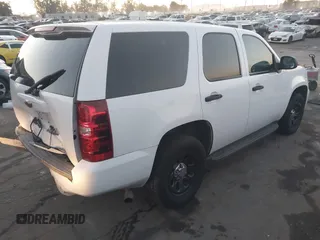 2009 Chevrolet Tahoe Police z VIN 1GNEC03059R274545, wystawiony jako IAAI lot #41156691 z przebiegiem 195 702 mil mil oraz . Historia ofert i sprzedaży dostępna na DreamBid. Obrazek 4.