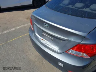2013 Hyundai Accent GLS with VIN KMHCT4AE8DU559571, listed as a IAAI auction lot 41830783 with 88,170 mi miles. Bid and sale history available at carsss.com. Image 6.