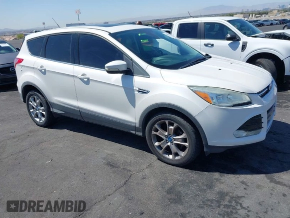 2013 Ford Escape SEL with VIN 1FMCU0HX1DUB99590, listed as a IAAI auction lot 41987910 with 129,954 mi miles. Bid and sale history available at carsss.com. Image 1.
