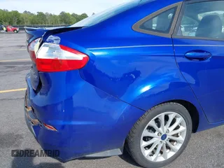 2014 Ford Fiesta SE with VIN 3FADP4BJ5EM190009, listed as a IAAI auction lot 42036976 with 157,575 mi miles. Bid and sale history available at carsss.com. Image 14.