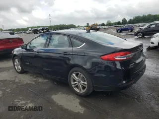 2018 Ford Fusion SE z VIN 3FA6P0LU8JR264630, wystawiony jako Copart lot #57036345 z przebiegiem 234 757 mil mil oraz Szkoda całkowita • Salvage title. Historia ofert i sprzedaży dostępna na DreamBid. Obrazek 2.