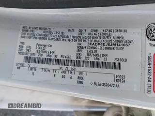 2018 Ford Fiesta SE z VIN 3FADP4EJ8JM141067, wystawiony jako IAAI lot #42417301 z przebiegiem 71 150 mil mil oraz . Historia ofert i sprzedaży dostępna na DreamBid. Obrazek 9.