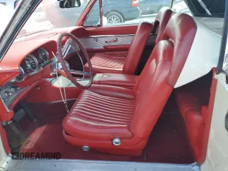 1961 Ford Thunderbird with VIN 1Y73Z112797, listed as a Copart auction lot 77574894 with 22,246 mi miles and Salvage Title. Bid and sale history available at DreamBid. Image 7.