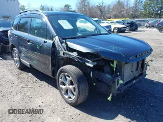 2016 Subaru Forester 2.5i Touring with VIN JF2SJAXC5GH436738, listed as a IAAI auction lot 41826980 with 127,695 mi miles. Bid and sale history available at carsss.com. Image 1.