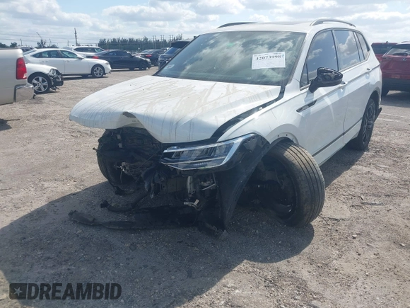 2022 Volkswagen Tiguan SE R-Line Black with VIN 3VVCB7AX5NM040222, listed as a IAAI auction lot 42073998 with 36,225 mi miles and . Bid and sale history available at DreamBid. Image 6.