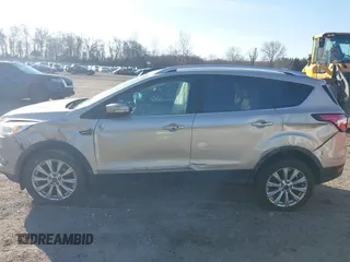 2017 Ford Escape Titanium with VIN 1FMCU0JD2HUD92675, listed as a IAAI auction lot 41834723 with 113,503 mi miles. Bid and sale history available at carsss.com. Image 14.