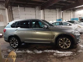 2018 BMW X5 xDrive35i with VIN 5UXKR0C53J0Y03214, listed as a IAAI auction lot 41509082 with 92,552 mi miles. Bid and sale history available at carsss.com. Image 13.