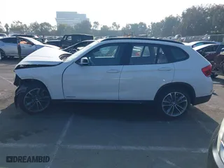 2014 BMW X1 xDrive28i with VIN WBAVL1C52EVY23658, listed as a IAAI auction lot 41153436 with 26,791 mi miles. Bid and sale history available at carsss.com. Image 15.