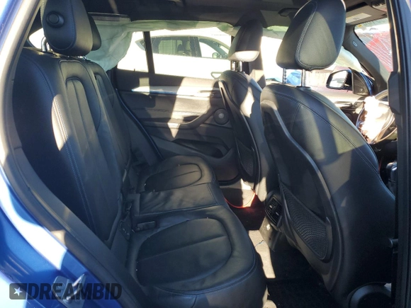 2016 BMW X1 xDrive28i with VIN WBXHT3C34G5F64741, listed as a Copart auction lot 88910015 with 0 mi miles and Salvage Title. Bid and sale history available at carsss.com. Image 12.