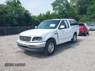 2000 Ford F-150 XL with VIN 1FTZF1720YNB37392, listed as a IAAI auction lot 42460974 with Not provided miles and . Bid and sale history available at DreamBid. Image 2.