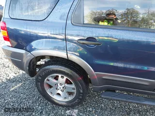 2004 Ford Escape XLT with VIN 1FMYU03134KA30806, listed as a IAAI auction lot 41449933 with 137,897 mi miles. Bid and sale history available at carsss.com. Image 6.