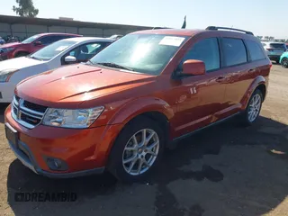 2014 Dodge Journey SXT with VIN 3C4PDCBB8ET276262, listed as a IAAI auction lot 42017477 with 151,262 mi miles. Bid and sale history available at carsss.com. Image 2.