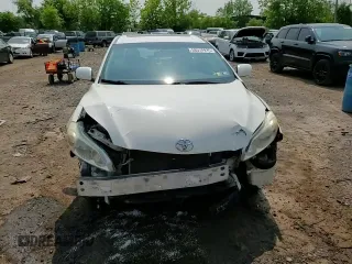 2009 Toyota Matrix S z VIN 2T1KE40E69C005557, wystawiony jako Copart lot #58575935 z przebiegiem 131 990 mil mil oraz Szkoda całkowita • Salvage title. Historia ofert i sprzedaży dostępna na DreamBid. Obrazek 14.