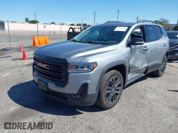 2023 GMC Acadia SLT with VIN 1GKKNML40PZ119581, listed as a IAAI auction lot 41841288 with 23,611 mi miles and . Bid and sale history available at DreamBid. Image 2.