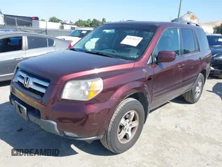 2007 Honda Pilot EX-L z VIN 5FNYF18567B011233, wystawiony jako IAAI lot #42325222 z przebiegiem 195 581 mil mil oraz . Historia ofert i sprzedaży dostępna na DreamBid. Obrazek 2.