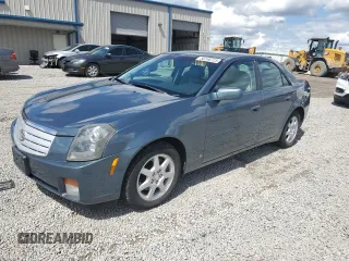 2006 Cadillac CTS z VIN 1G6DM57T560180879, wystawiony jako Copart lot #56146725 z przebiegiem 141 535 mil mil oraz Szkoda całkowita • Salvage title. Historia ofert i sprzedaży dostępna na DreamBid. Obrazek 1.