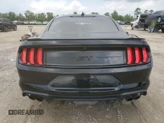 2023 Ford Mustang GT with VIN 1FA6P8CF7P5304031, listed as a Copart auction lot 54693515 with 27,048 mi miles and Salvage Title. Bid and sale history available at carsss.com. Image 6.