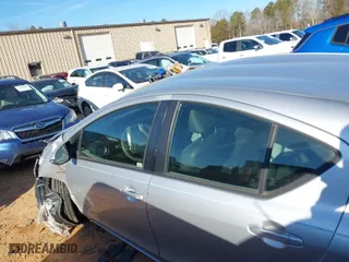2012 Toyota Prius c One with VIN JTDKDTB35C1011662, listed as a IAAI auction lot 41424171 with 200,013 mi miles. Bid and sale history available at carsss.com. Image 14.