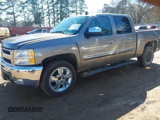 2013 Chevrolet Silverado 1500 LT with VIN 3GCPCSE06DG233909, listed as a IAAI auction lot 41601589 with 328,365 mi miles and . Bid and sale history available at DreamBid. Image 17.