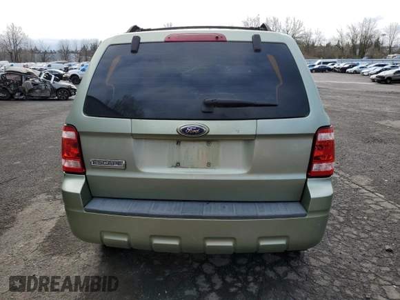 2008 Ford Escape XLS с VIN 1FMCU02Z58KE30129, выставлен на аукционе Copart как лот 48611765 с пробегом 97 014 миль миль и Списание • Salvage title. История ставок и продаж доступна на DreamBid. Изображение 6.