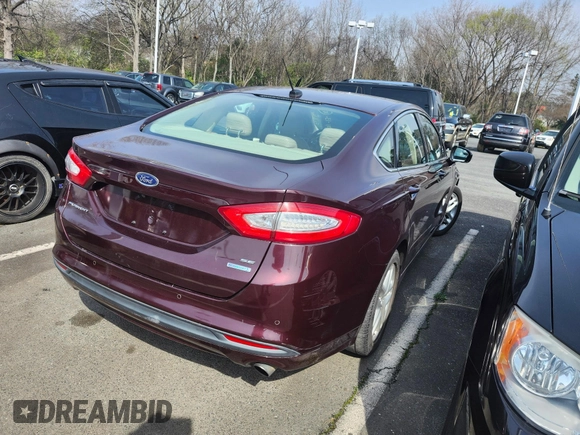 2013 Ford Fusion SE with VIN 3FA6P0HR7DR225469, listed as a IAAI auction lot 41821847 with 162,865 mi miles. Bid and sale history available at carsss.com. Image 4.