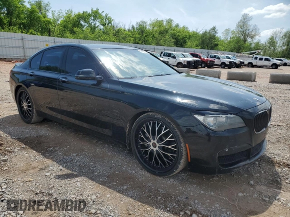 2013 BMW 7 Series 750i with VIN WBAYA8C5XDC996785, listed as a Copart auction lot 54854165 with 134,472 mi miles and Clean Title. Bid and sale history available at DreamBid. Image 4.