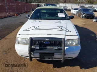 2005 Ford Police Interceptor z VIN 2FAFP71WX5X164985, wystawiony jako IAAI lot #41363721 z przebiegiem 147 950 mil mil oraz . Historia ofert i sprzedaży dostępna na DreamBid. Obrazek 12.