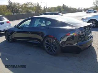 2022 Tesla Model S Plaid with VIN 5YJSA1E62NF460634, listed as a IAAI auction lot 41372644 with 16,050 mi miles and . Bid and sale history available at DreamBid. Image 14.